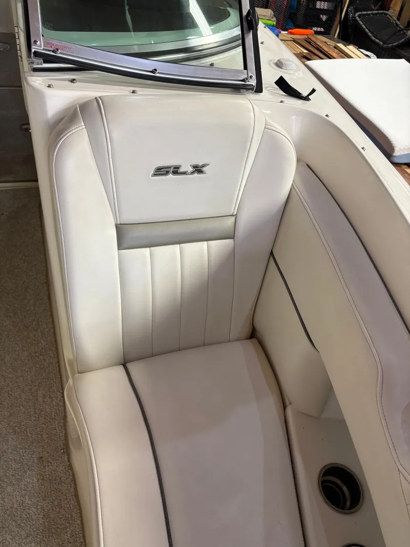 Slide: The Image of White leather seat on a 2007 Sea Ray 270 SLX boat. - 11