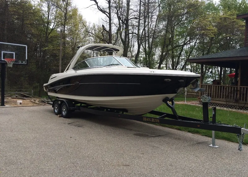 Slide: The Image of 2007 Sea Ray 270 SLX boat on trailer outdoors. - 3