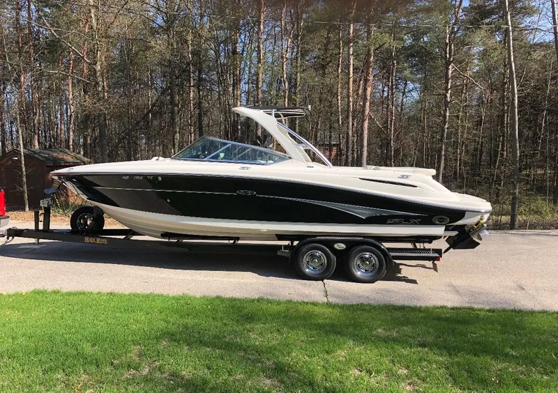 Slide: The Image of 2007 Sea Ray 270 SLX boat on trailer in forest setting. - 5