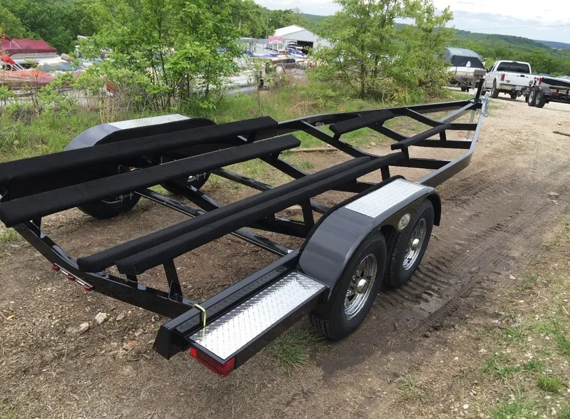 Slide: The Image of Boat trailer for 2007 Sea Ray 270 SLX on dirt path. - 6