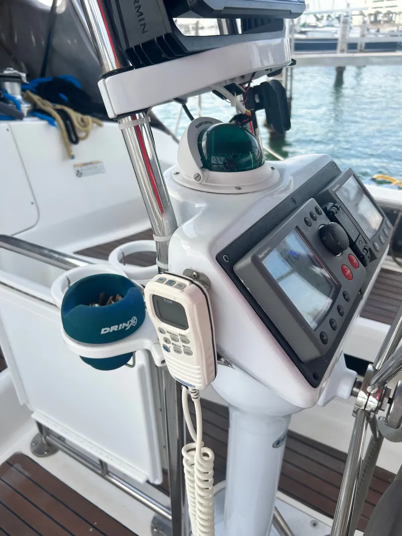 Slide: The Image of 2006 Hunter 38 Ft Sloop helm with navigation equipment. - 10