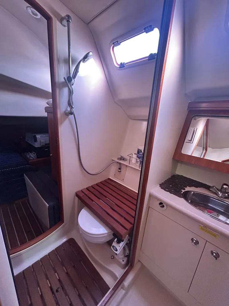 Slide: The Image of Interior of a 2006 Hunter 38 Ft Sloop with bathroom and shower. - 27