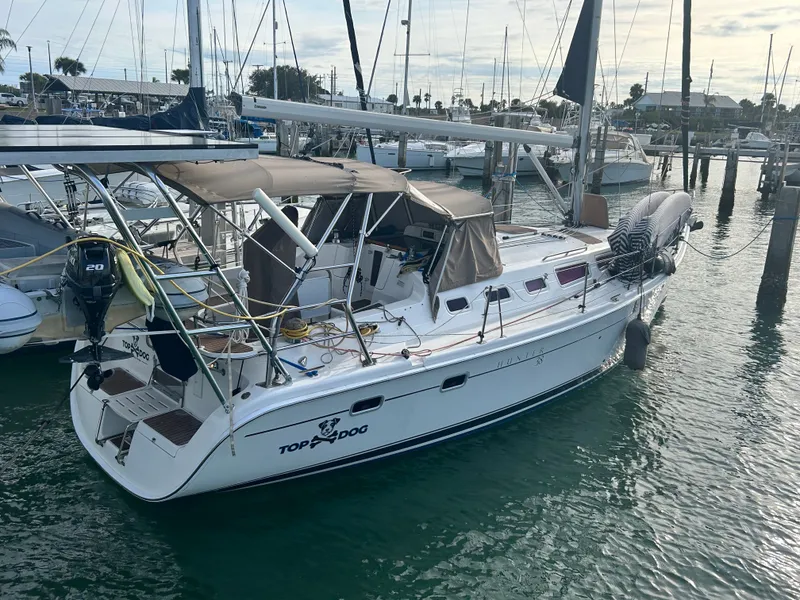 Slide: The Image of 2006 Hunter 38 Ft Sloop docked in marina. - 3