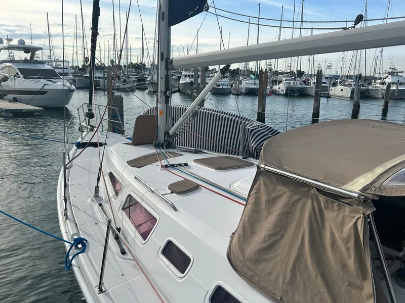 Slide: The Image of 2006 Hunter 38 Ft Sloop docked in marina. - 8