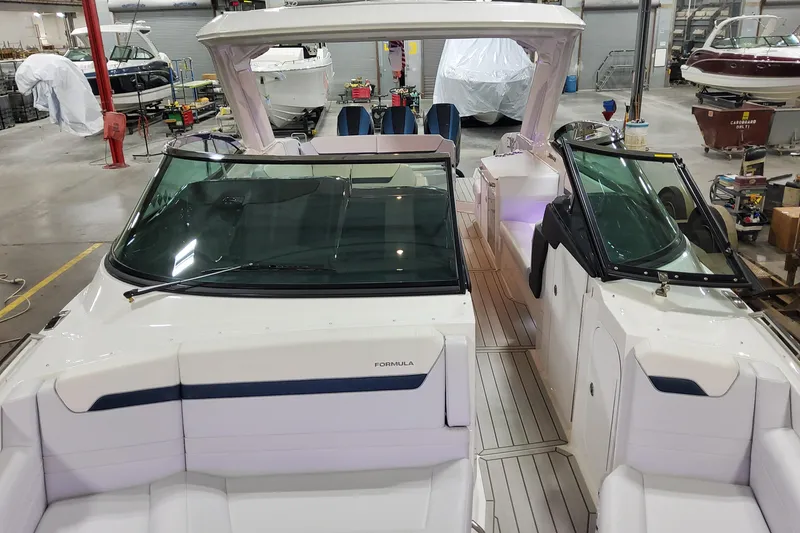 Slide: The Image of 2026 Formula 360 Crossover Bowrider OB in a workshop setting, showcasing sleek design. - 16