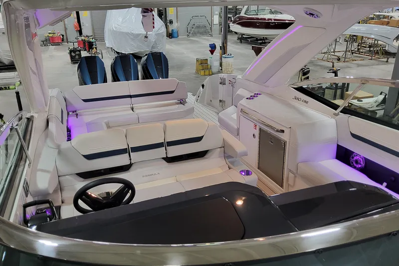 Slide: The Image of 2026 Formula 360 Crossover Bowrider OB interior with modern seating and ambient lighting. - 17