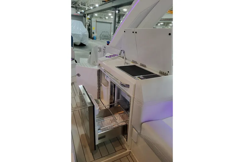 Slide: The Image of 2026 Formula 360 Crossover Bowrider OB interior with open storage and sleek design. - 25