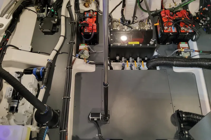 Slide: The Image of Engine compartment of 2026 Formula 360 Crossover Bowrider OB, showcasing wiring and components. - 29