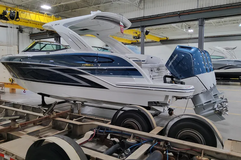 Slide: The Image of 2026 Formula 360 Crossover Bowrider OB in a showroom, featuring a sleek design and powerful engine. - 3