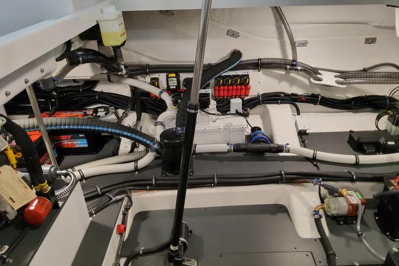 Slide: The Image of Engine compartment of 2026 Formula 360 Crossover Bowrider OB, showcasing wiring and components. - 31