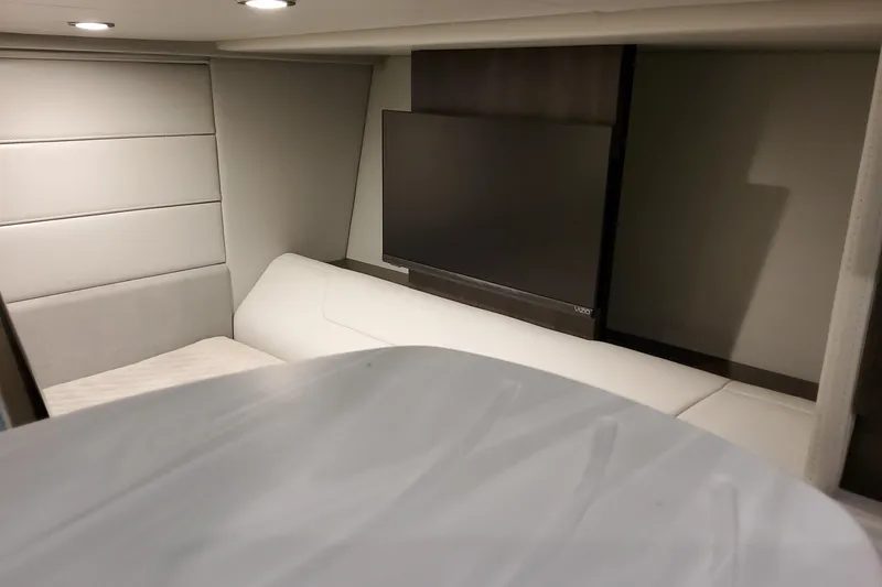 Slide: The Image of Interior of 2026 Formula 360 Crossover Bowrider OB with modern seating and TV. - 33