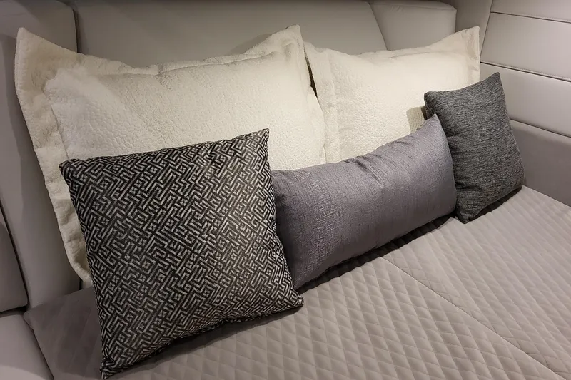 Slide: The Image of Luxurious bedding with decorative pillows in the 2026 Formula 360 Crossover Bowrider OB. - 35