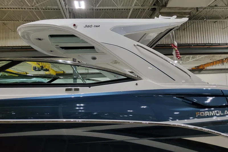 Slide: The Image of 2026 Formula 360 Crossover Bowrider OB in a showroom, showcasing sleek design and modern features. - 4