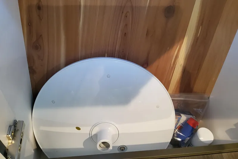 Slide: The Image of Storage compartment in a 2026 Formula 360 Crossover Bowrider OB boat. - 40