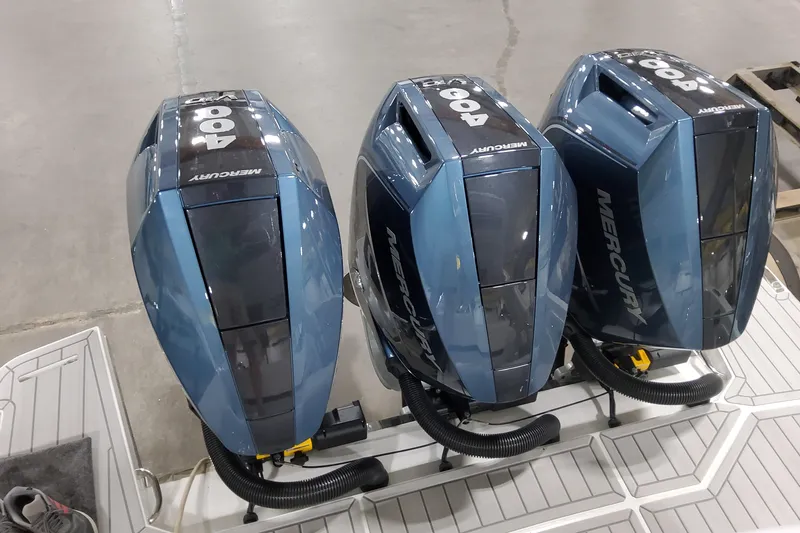 Slide: The Image of Triple Mercury 400 outboard engines on a 2026 Formula 360 Crossover Bowrider OB boat. - 9