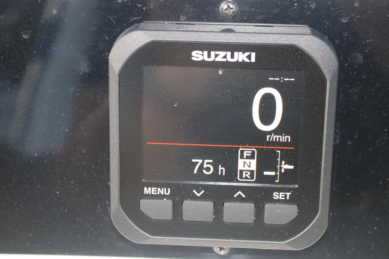 Slide: The Image of Suzuki digital display on 2022 Pioneer 220 Bay Sport boat, showing 75 hours. - 15