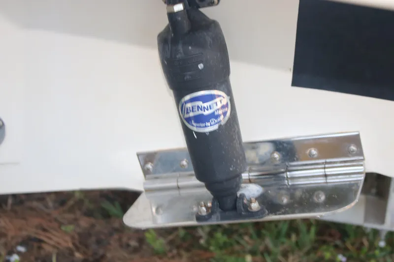Slide: The Image of Bennett Marine trim tab on 2022 Pioneer 220 Bay Sport boat. - 6