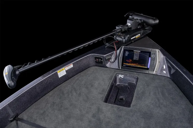 Slide: The Image of Manufacturer Provided Image: 2025 Skeeter WX2200 boat with advanced navigation system and trolling motor. - 11