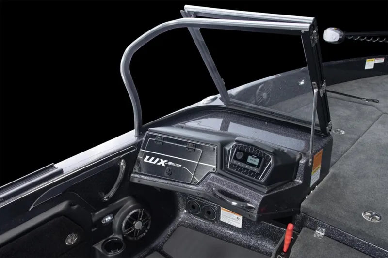 Slide: The Image of Manufacturer Provided Image: 2025 Skeeter WX2200 boat dashboard with modern controls and sleek design. - 13