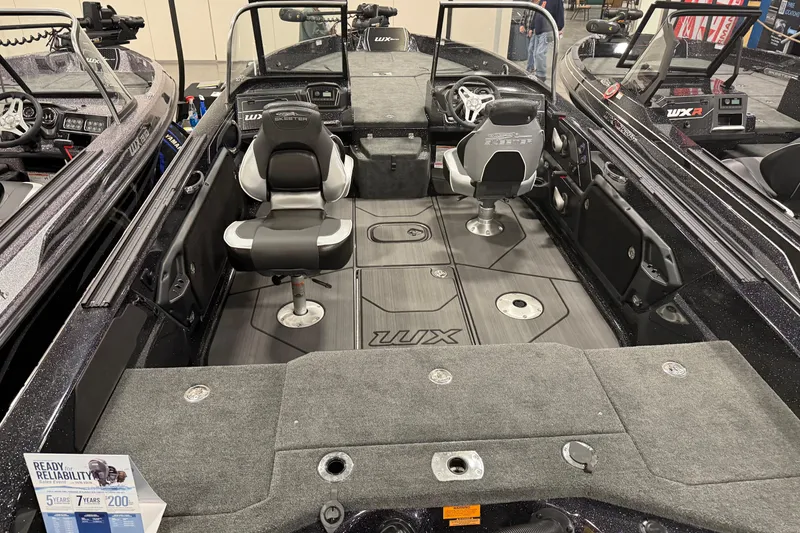 Slide: The Image of 2025 Skeeter WX2200 boat interior with seating and control panel, showcasing modern design. - 3