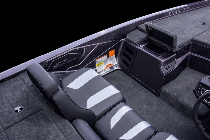 Slide: The Image of Manufacturer Provided Image: 2024 Skeeter ZX150 boat interior with sleek seating and storage compartments. - 14