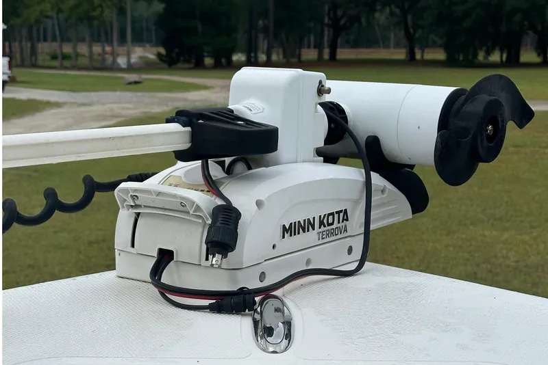 Slide: The Image of Minn Kota Terrova trolling motor on 2022 BlackJack 256 Bay boat, outdoor setting. - 17