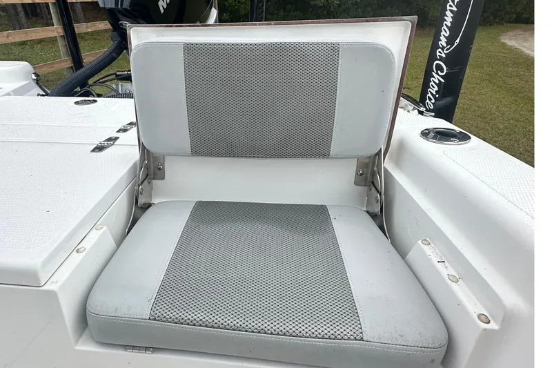 Slide: The Image of 2022 BlackJack 256 Bay boat seat with gray cushioned upholstery. - 4