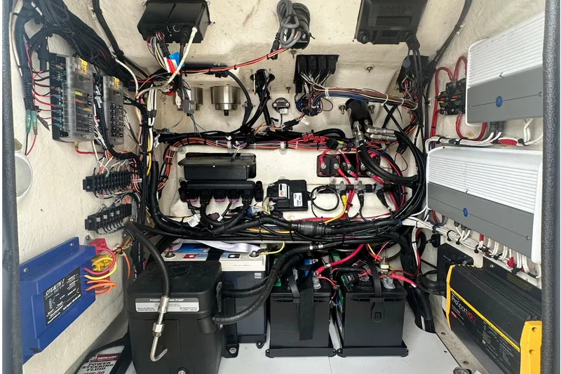 Slide: The Image of Electrical system of a 2022 BlackJack 256 Bay boat, showcasing wiring and components. - 8