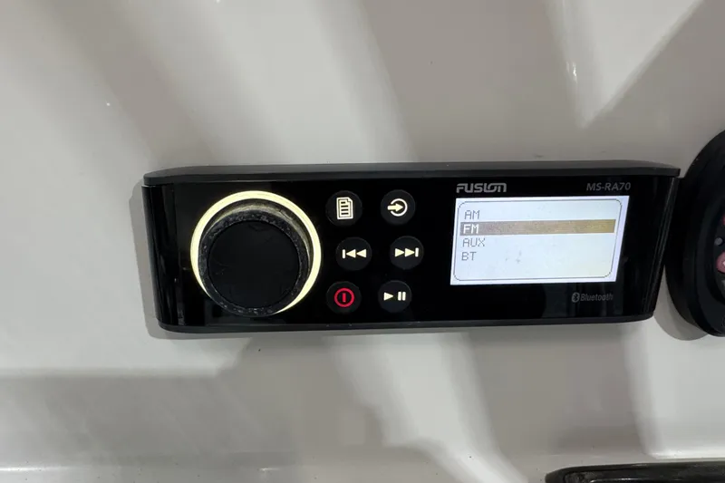Slide: The Image of Fusion MS-RA70 stereo system on 2013 Pathfinder 2400 V boat dashboard. - 17