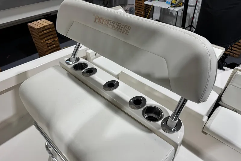 Slide: The Image of 2013 Pathfinder 2400 V boat seat with integrated cup holders. - 28