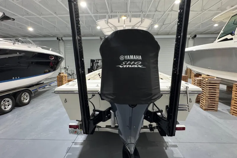Slide: The Image of 2013 Pathfinder 2400 V boat with Yamaha SHO VMAX engine in a storage facility. - 7