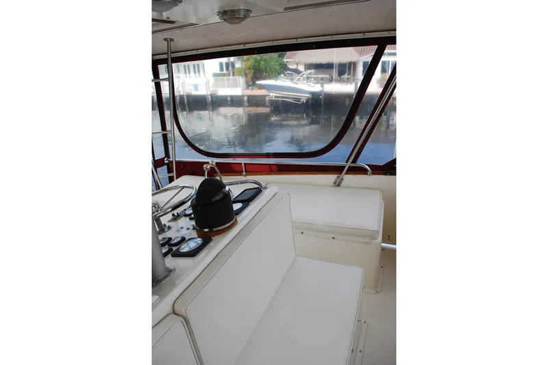 Slide: The Image of Interior view of 1987 Jersey Dawn boat with helm and seating area. - 12