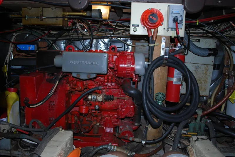 Slide: The Image of Engine room of 1987 Jersey Dawn boat with Westerbeke engine and various equipment. - 22