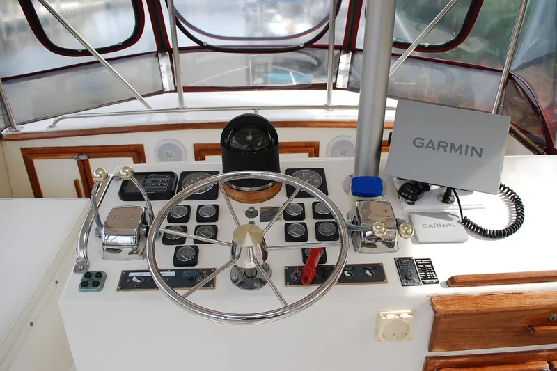 Slide: The Image of Control panel of a 1987 Jersey Dawn boat with Garmin navigation system. - 8