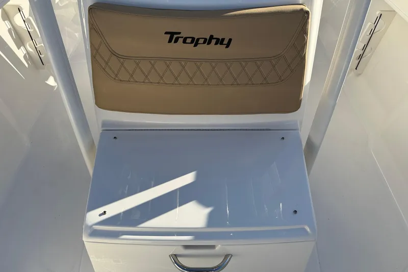 Slide: The Image of 2026 Bayliner Trophy T22CC boat seat with storage compartment. - 15