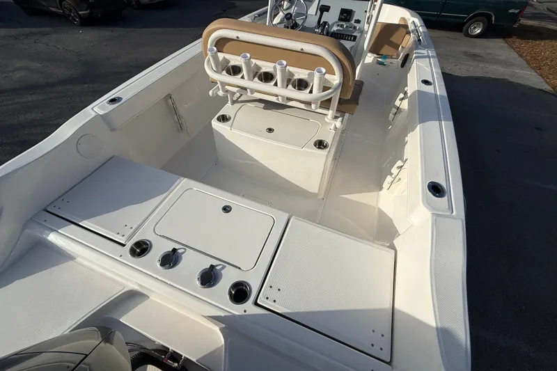 Slide: The Image of 2026 Bayliner Trophy T22CC boat interior with seating and storage compartments. - 6