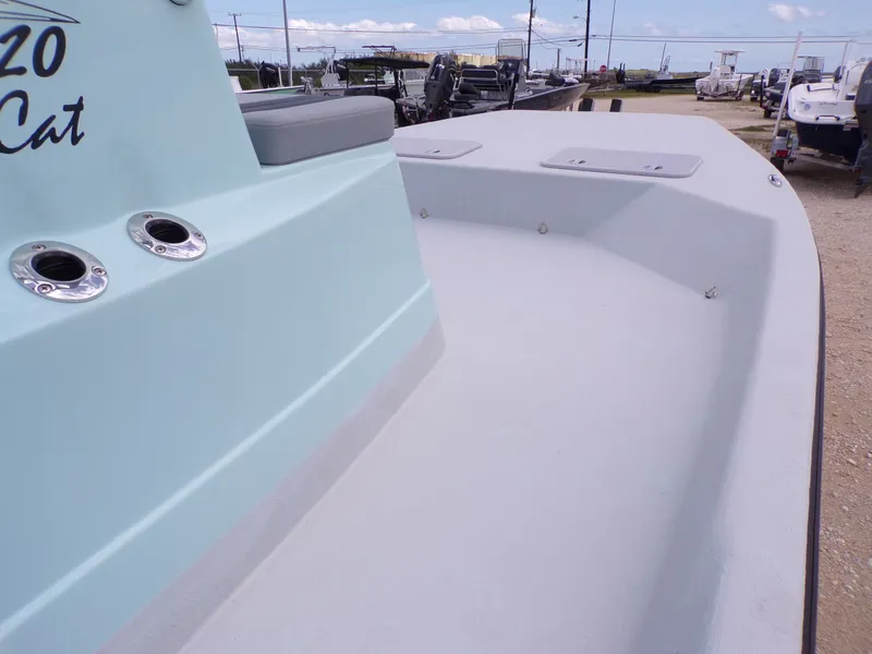 Slide: The Image of Shoalwater 20' Catamaran 2026, front deck view outdoors. - 17