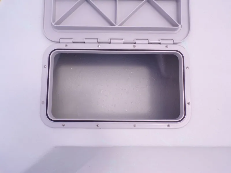 Slide: The Image of Open storage compartment on a 2026 Shoalwater 20' Catamaran. - 20