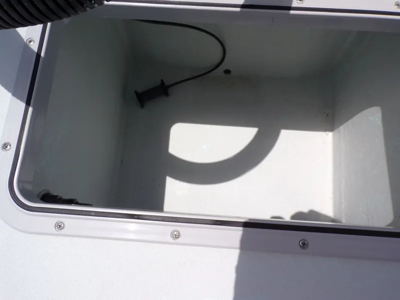 Slide: The Image of Interior view of a Shoalwater 20' Catamaran storage compartment, 2026 model. - 29