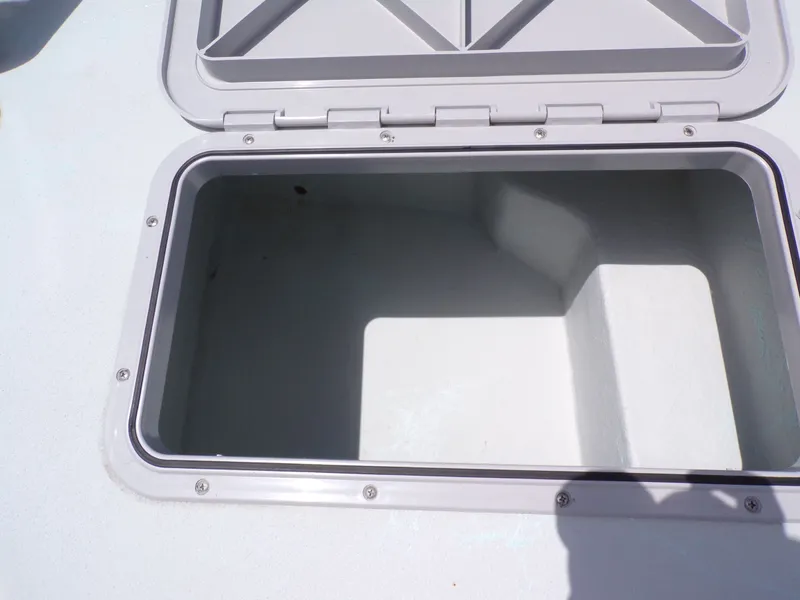 Slide: The Image of Open storage compartment on a 2026 Shoalwater 20' Catamaran. - 30