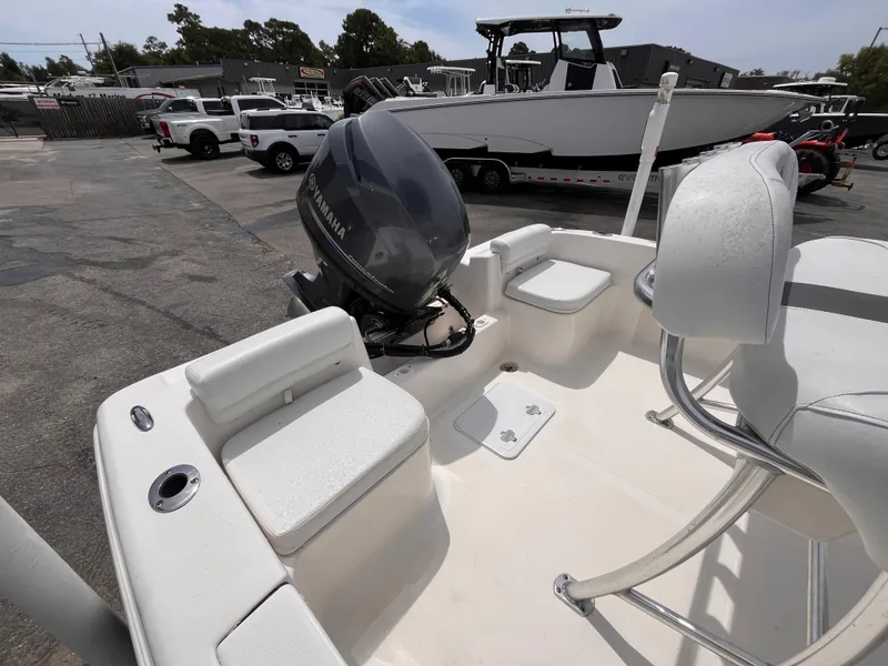 Slide: The Image of 2014 Tidewater 196 CC Adventure boat with outboard motor. - 5