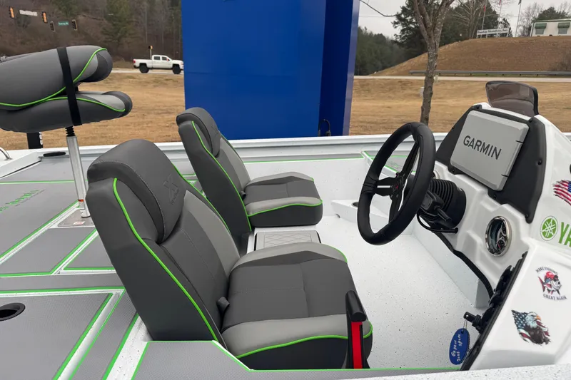 Slide: The Image of 2026 Xpress H20 Bass boat interior with Garmin system and stylish seating. - 10