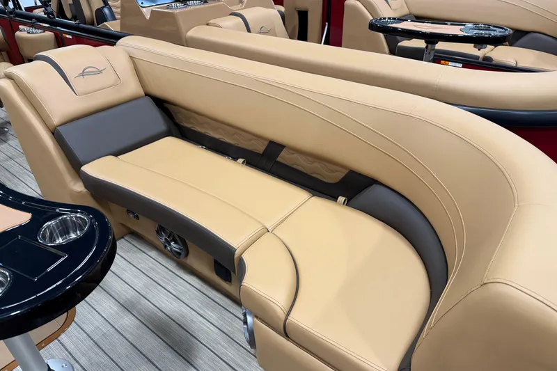 Slide: The Image of Luxurious seating on 2026 SunCatcher Fusion 324RC boat with beige and gray upholstery. - 3