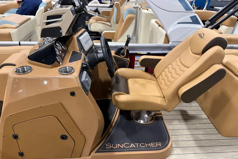 Slide: The Image of Luxurious SunCatcher Fusion 324RC boat interior, featuring a modern helm and comfortable captain's chair. - 5