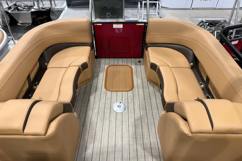 Slide: The Image of Luxurious interior of 2026 SunCatcher Fusion 324RC pontoon boat with tan seating. - 7