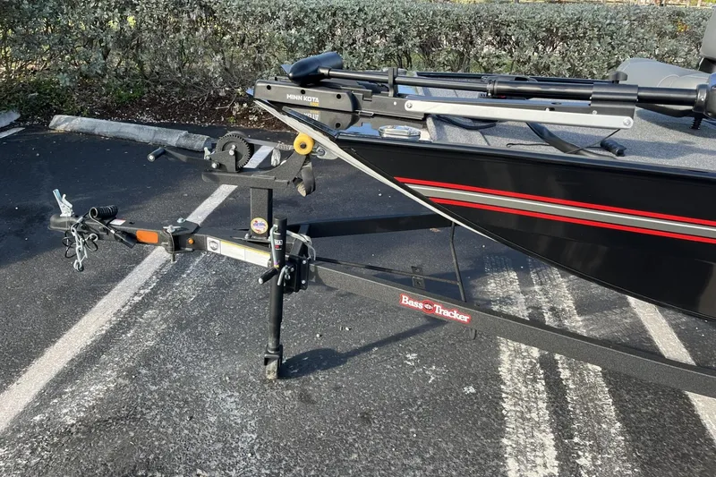 Slide: The Image of 2026 Tracker Bass Tracker Classic XL boat on trailer in parking lot. - 10