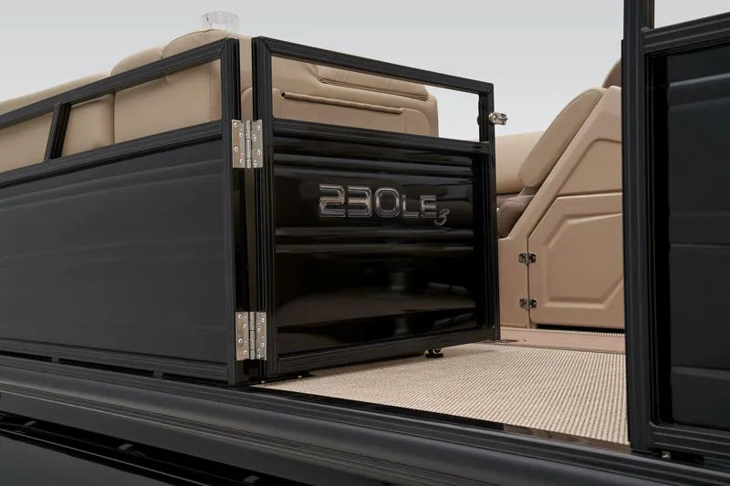 Slide: The Image of 2025 Regency 230 LE3 boat seat storage compartment, open, showcasing interior design and functionality. - 14