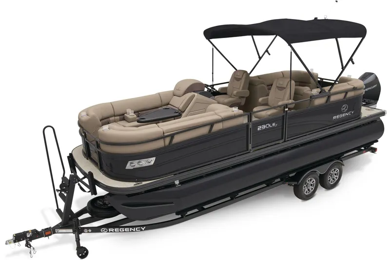 Slide: The Image of 2025 Regency 230 LE3 pontoon boat on trailer, parked outdoors with canopy. - 2