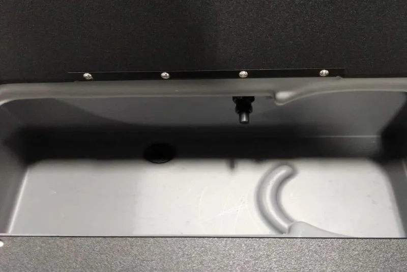 Slide: The Image of Livewell compartment in 2026 Sun Tracker Fishin' Barge 22 XP3 boat. - 115