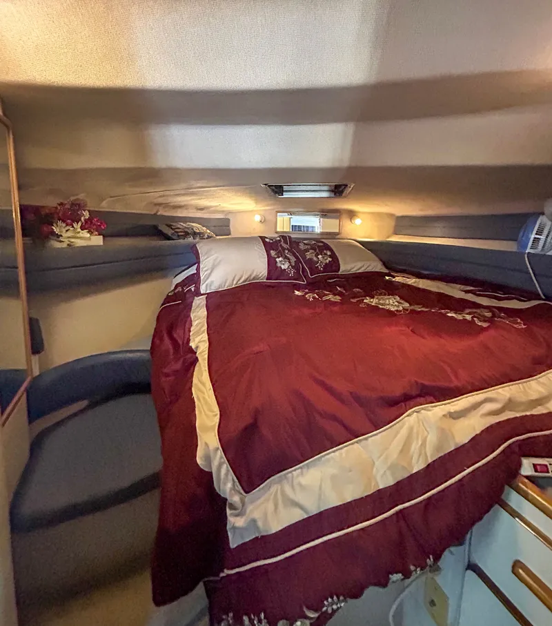 Slide: The Image of Interior of 1993 Sea Ray Express Bridge 350 with cozy bed. - 10